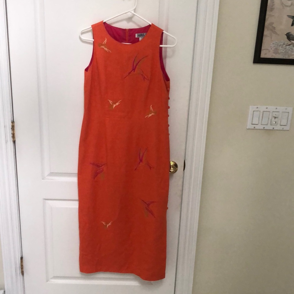 Orange dress with embroidered birds